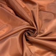 Tissu doublure polyester marron cuivré uni Tissu doublure polyester marron cuivré uni