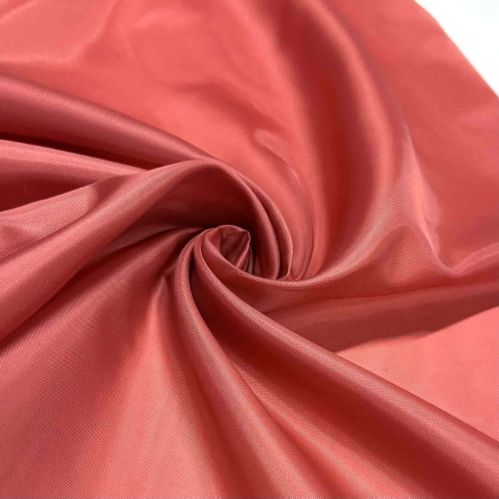 Tissu doublure polyester saumon uni Tissu doublure polyester saumon uni