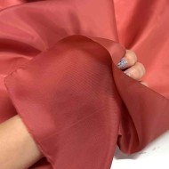 Tissu doublure polyester saumon uni Tissu doublure polyester saumon uni