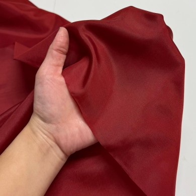 Tissu doublure polyester rouge uni