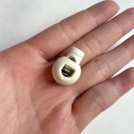 Bloque lacet blanc plastique 15mm