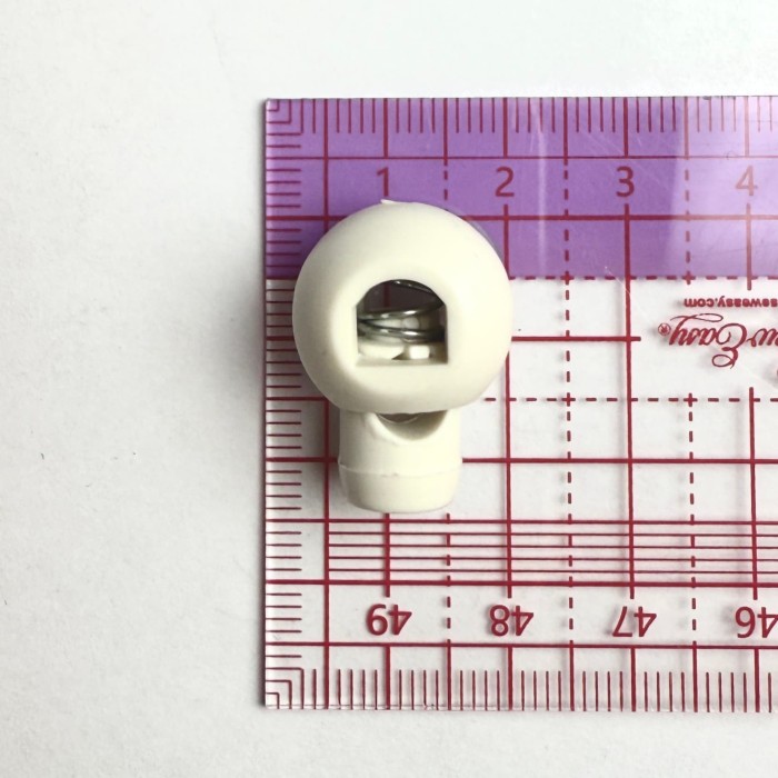 Bloque lacet blanc plastique 15mm