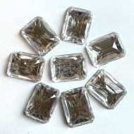 Pierre strass à coudre 2 trous transparent fond or 25mm