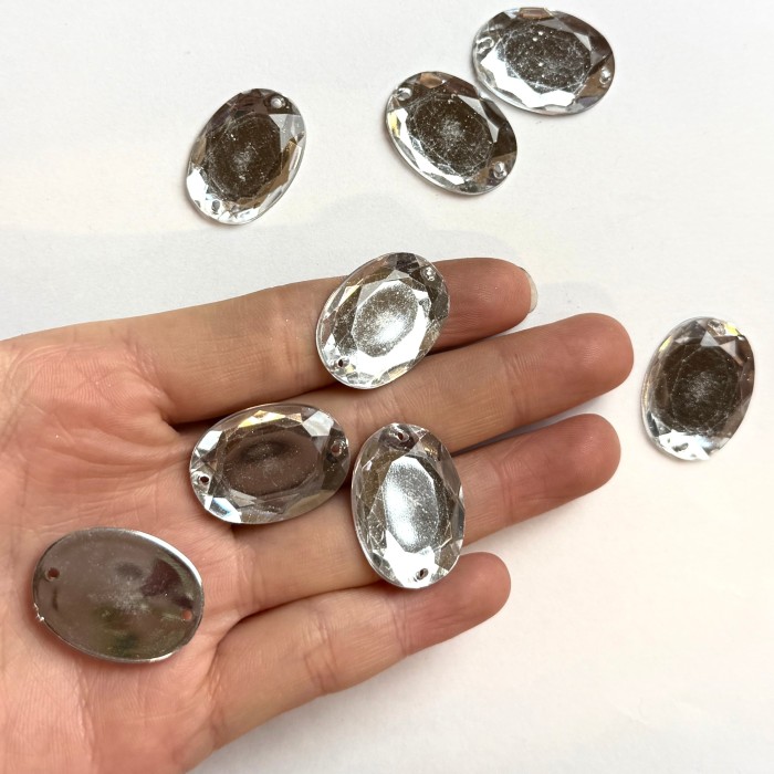 Pierre strass à coudre ovale 2 trous transparent fond argent 25mm