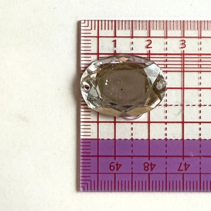 Pierre strass à coudre ovale 2 trous transparent fond argent 25mm