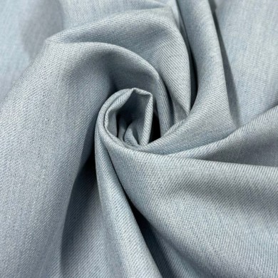 Tissu viscose laine vierge bleu ciel aspect denim - Haute couture Tissu viscose laine vierge bleu ciel aspect denim - Haute couture