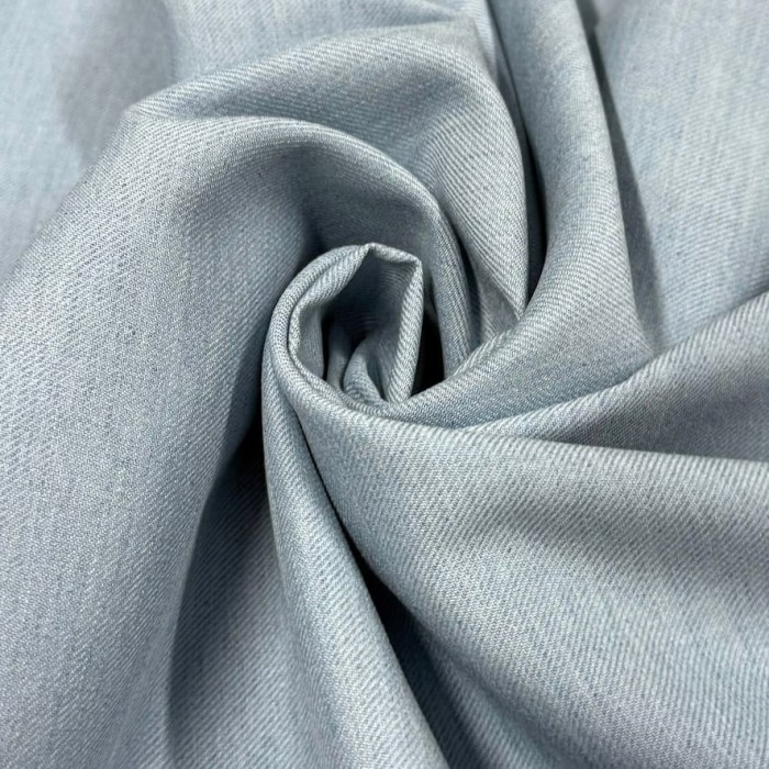 Tissu viscose laine vierge bleu ciel aspect denim - Haute couture Tissu viscose laine vierge bleu ciel aspect denim - Haute couture