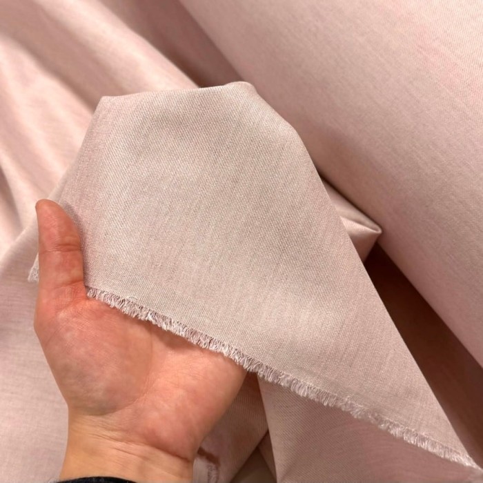 Tissu viscose laine vierge rose pâle aspect denim - Haute couture Tissu viscose laine vierge rose pâle aspect denim - Haute couture