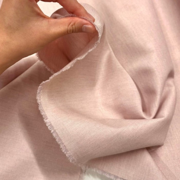 Tissu viscose laine vierge rose pâle aspect denim - Haute couture Tissu viscose laine vierge rose pâle aspect denim - Haute couture