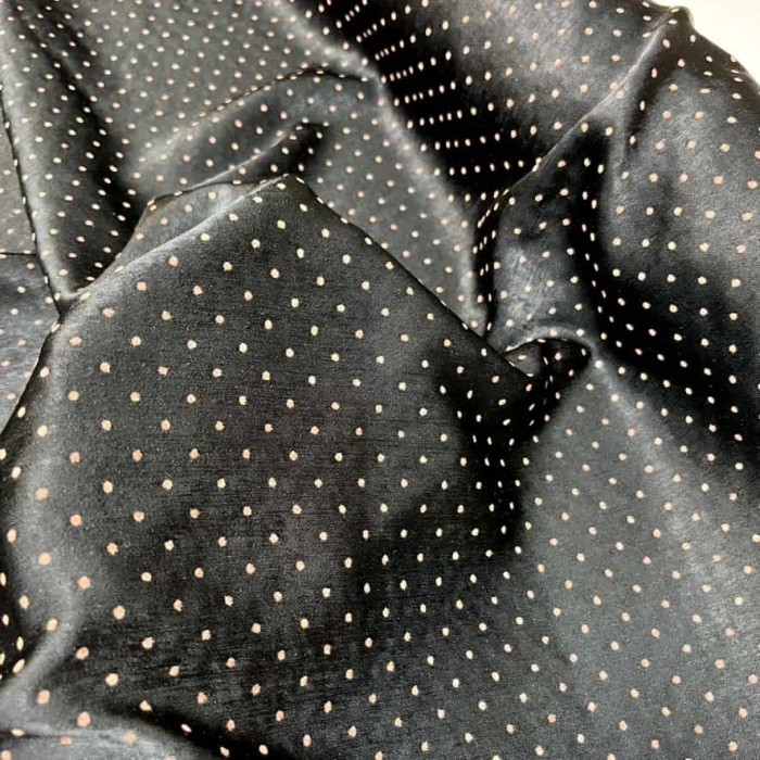 Tissu polyester petit pois dorée noir brillant