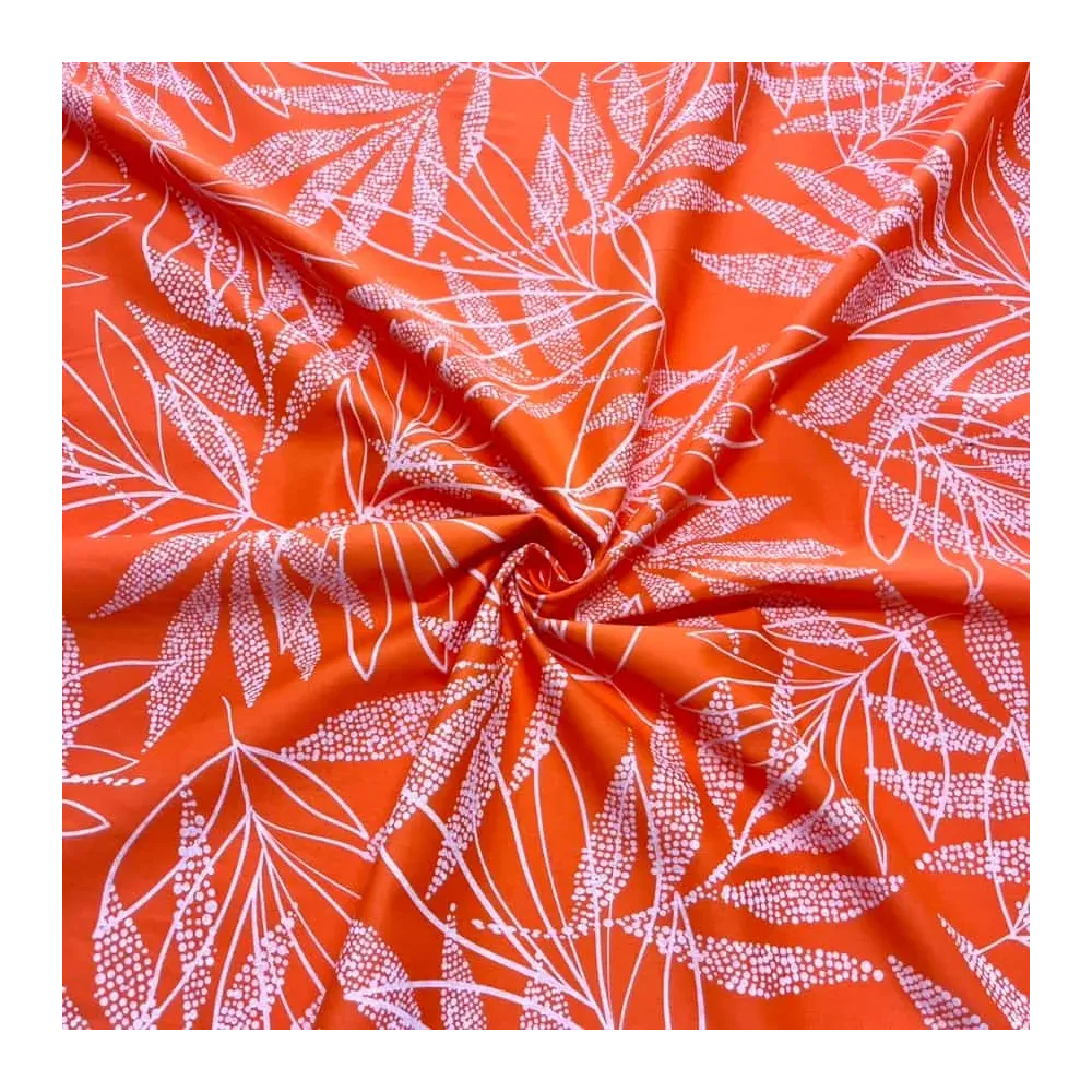 Tissu coton élasthanne feuille orange