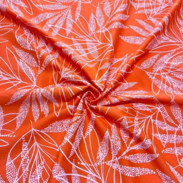 Tissu coton élasthanne feuille orange