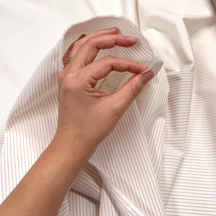 Tissu coton popeline blanc à rayures abricot - Haute couture