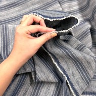 Tissu jeans coton à rayures texturées bleu marine et gris chiné avec lurex Tissu jeans coton à rayures texturées bleu marine et gris chiné avec lurex