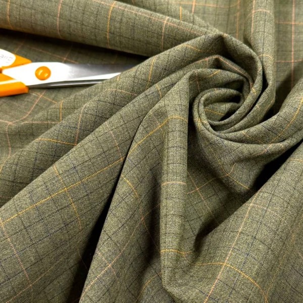 Tissu laine polyamide kaki à carreaux oranges et noirs Tissu laine polyamide kaki à carreaux oranges et noirs