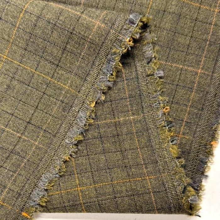 Tissu laine polyamide kaki à carreaux oranges et noirs Tissu laine polyamide kaki à carreaux oranges et noirs