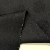 Tissu laine polyester à pois noirs sur fond noir Tissu laine polyester à pois noirs sur fond noir