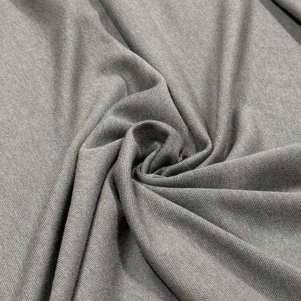Tissu laine fibres mélangées stretch uni gris Tissu laine fibres mélangées stretch uni gris