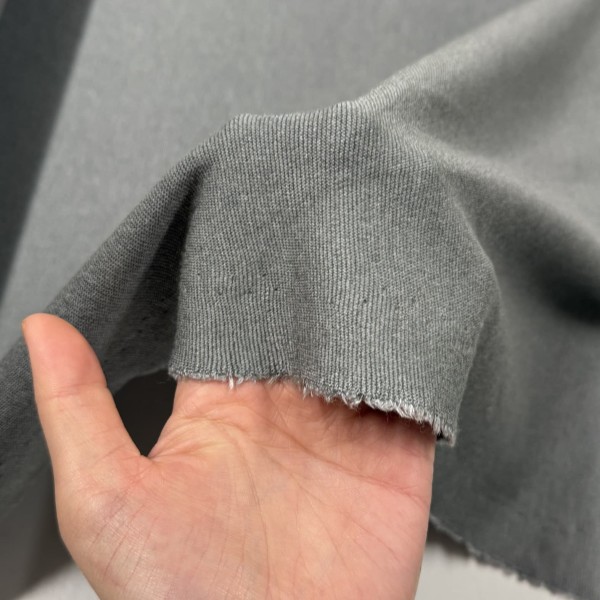 Tissu laine fibres mélangées stretch uni gris Tissu laine fibres mélangées stretch uni gris