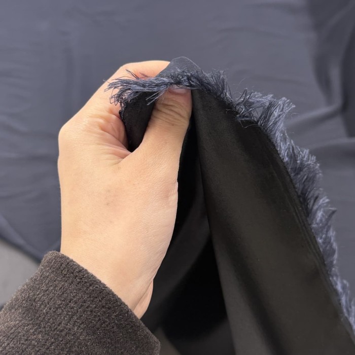 Tissu polyester viscose élasthanne uni bleu foncé Tissu polyester viscose élasthanne uni bleu foncé