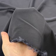 Tissu polyester viscose élasthanne uni bleu foncé Tissu polyester viscose élasthanne uni bleu foncé