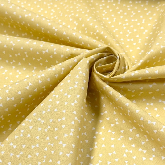 Tissu Coton imprimé Yozid petits triangles blancs sur jaune Tissu Coton imprimé Yozid petits triangles blancs sur jaune