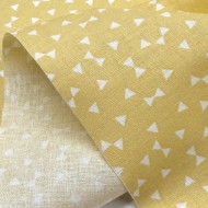 Tissu Coton imprimé Yozid petits triangles blancs sur jaune Tissu Coton imprimé Yozid petits triangles blancs sur jaune