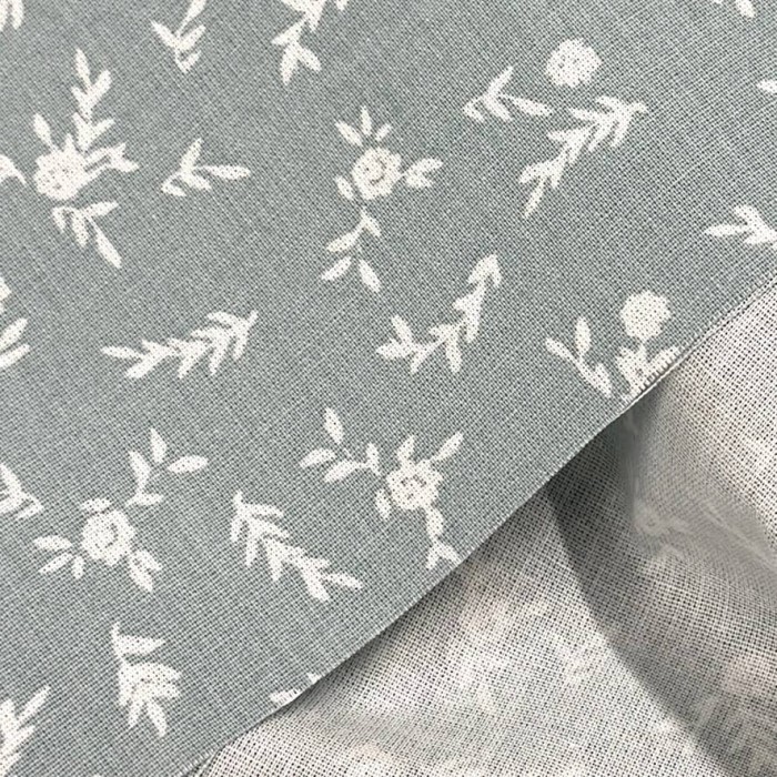 Tissu Coton imprimé Becky fleurs blanches sur vert sauge Tissu Coton imprimé Becky fleurs blanches sur vert sauge
