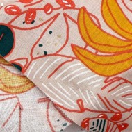 Tissu Coton imprimé Guzalor feuillage tropical & bananes corail