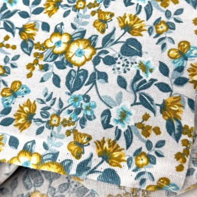 Tissu Coton imprimé fleurs et papillons sur bleu gris