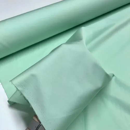 Tissu popeline de coton vert d'eau uni - Haute couture