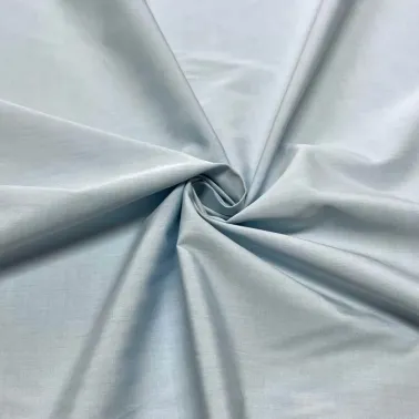 Tissu popeline de coton bleu ciel uni - Haute couture